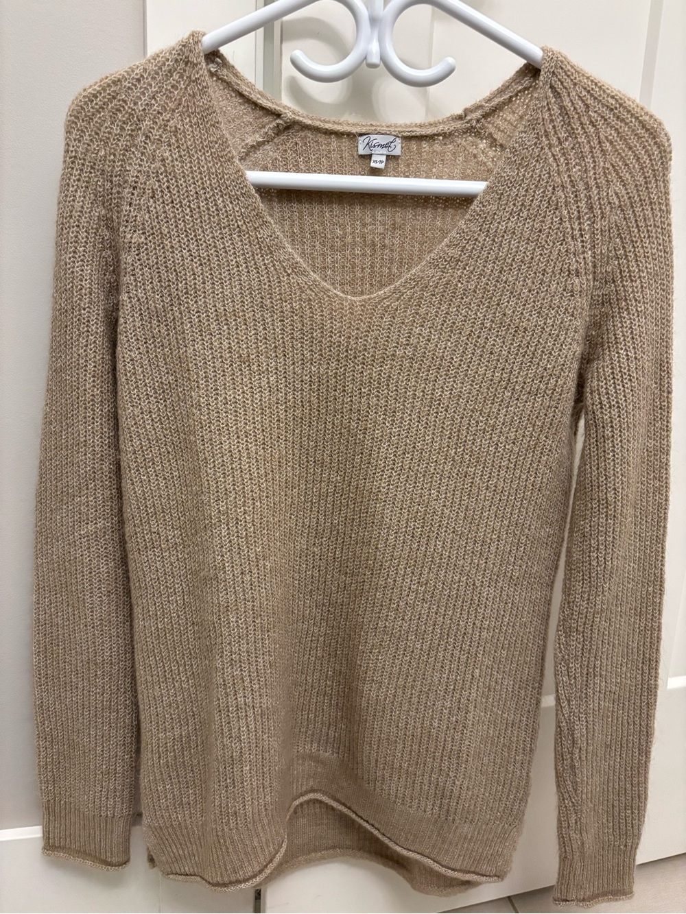Slightly oversized XS kismet sweater.